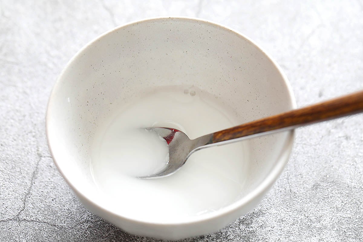 Potato starch slurry in a bowl.