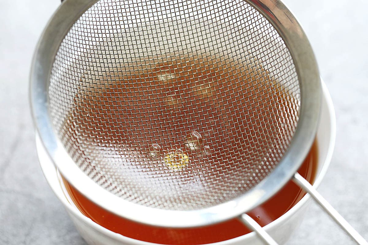 Starch lumps on a fine mesh strainer.