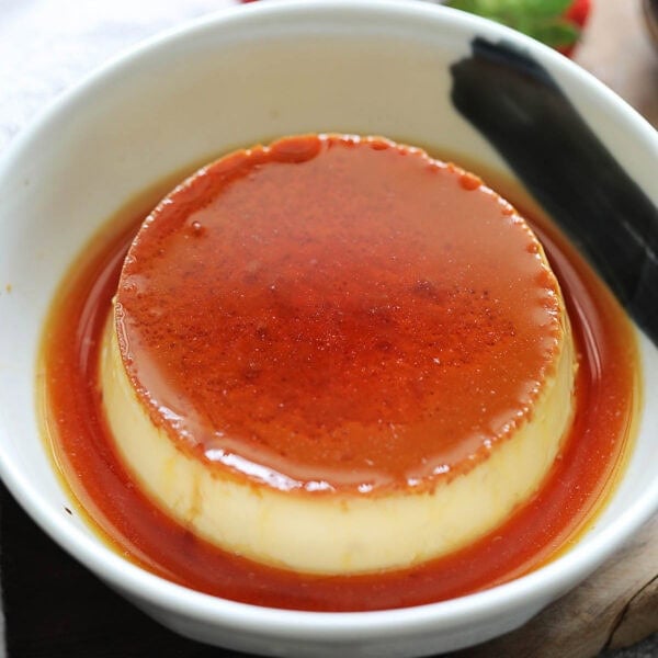 Flan dessert recipe served in a shallow dish.
