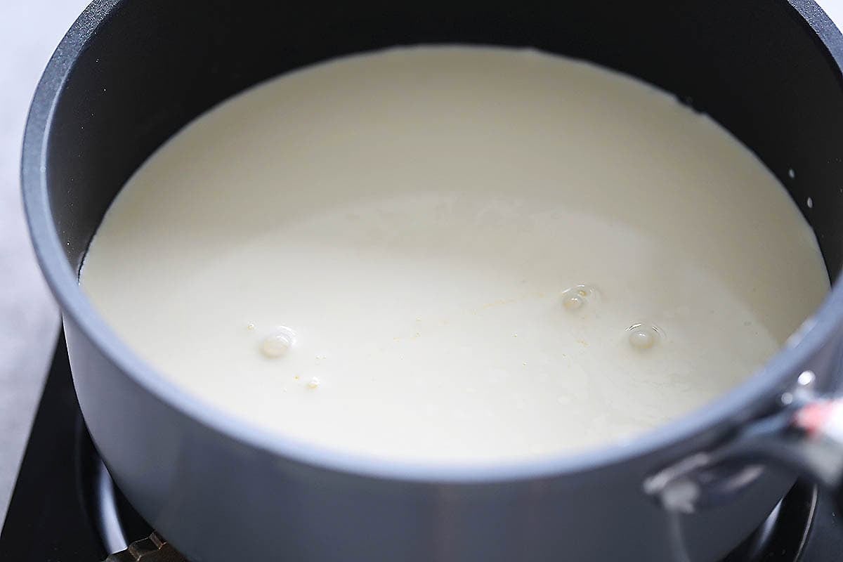 Milk mixture in a saucepan.