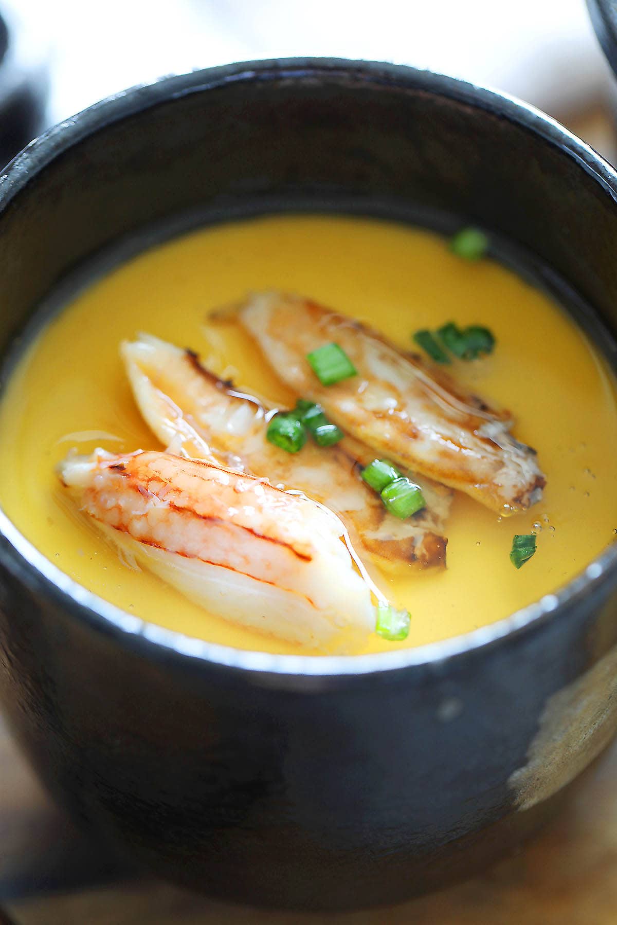 Japanese steamed egg topped with homemade dashi sauce.