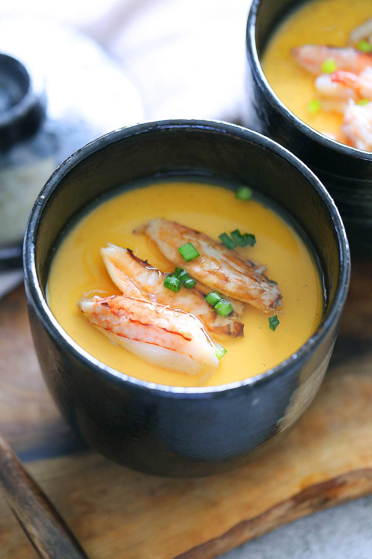Japanese steamed egg custard recipe topped with crab meat and scallions.