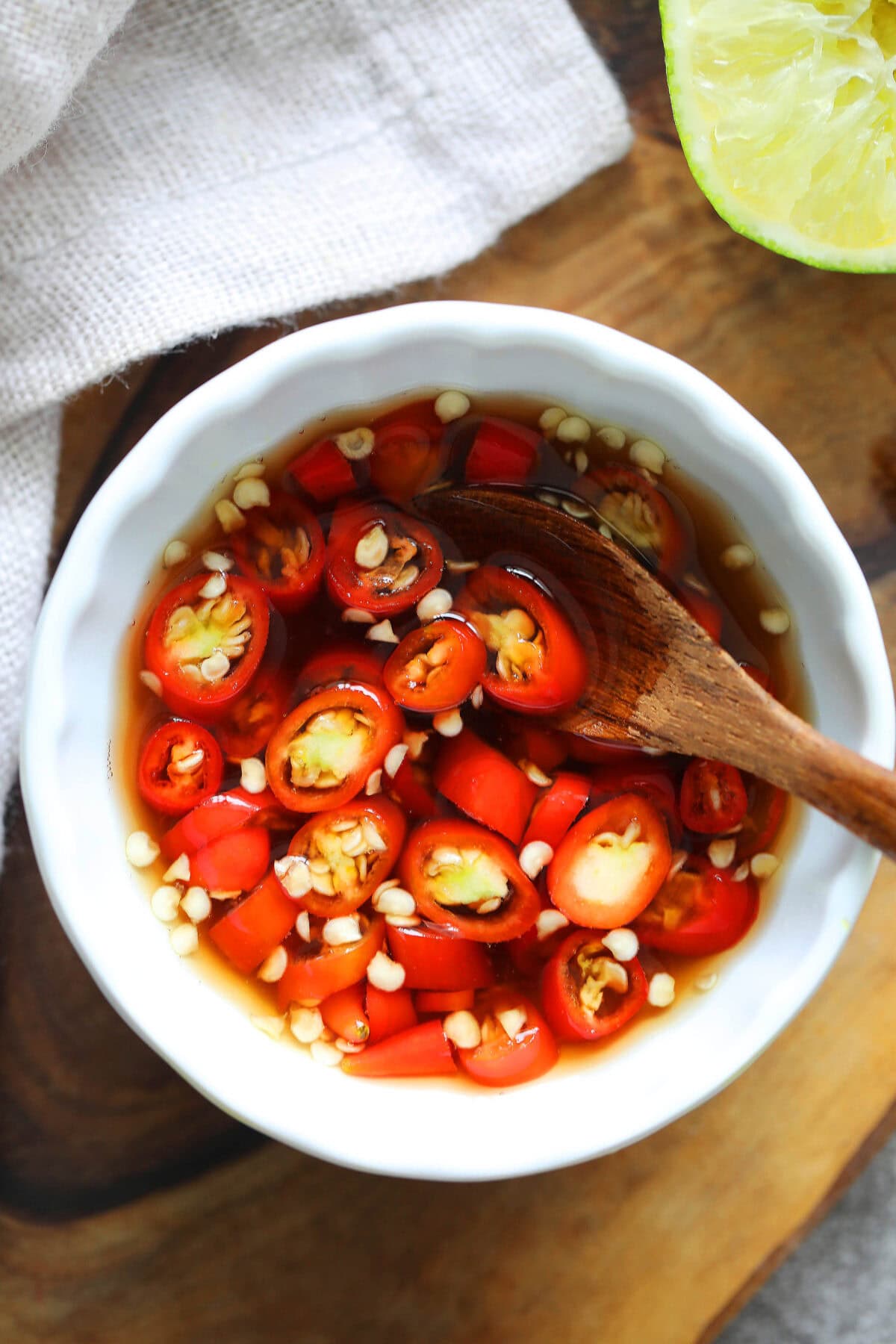 Thai nam pla prik recipe with fish sauce and bird's eye chilies.