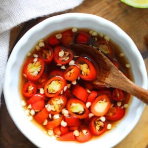 Thai nam pla prik recipe with fish sauce and bird's eye chilies.