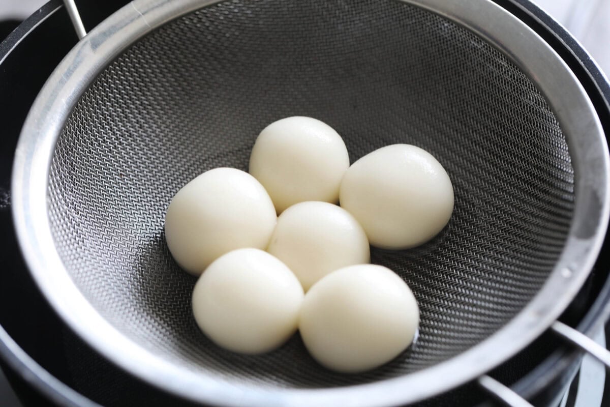 Dango in a strainer.