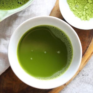 How to make matcha, freshly made matcha in a bowl.