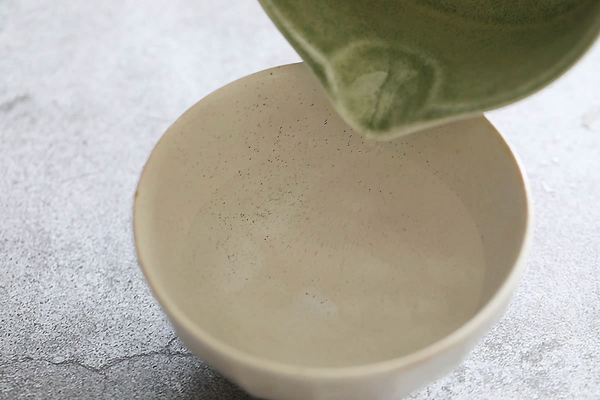 Hot water poured into a bowl.