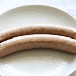 Sausages on a plate.