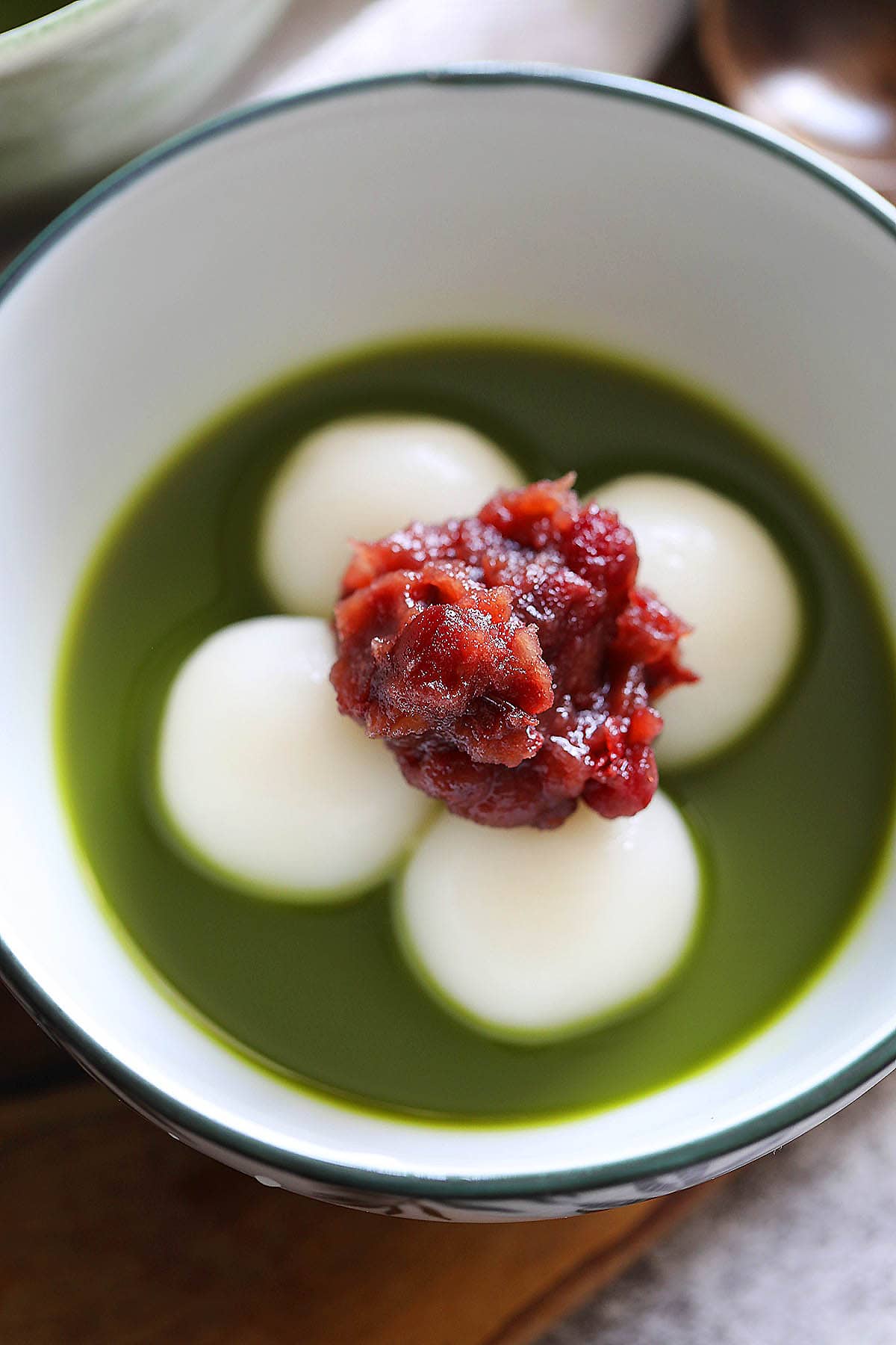 Easy matcha zenzai recipe with homemade shiratama dango served in a bowl.