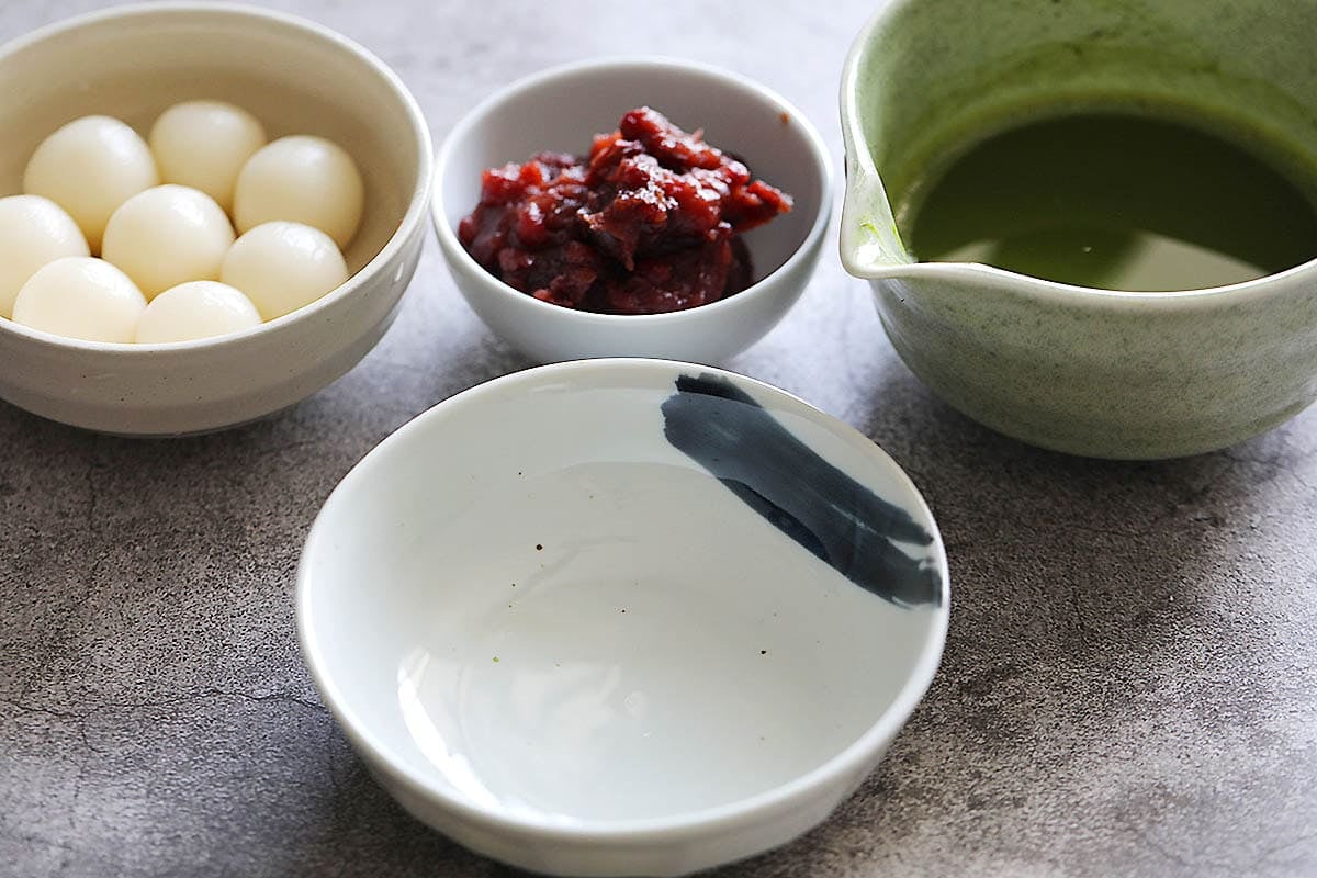 Shiratama dango, sweet red bean paste, and matcha tea.