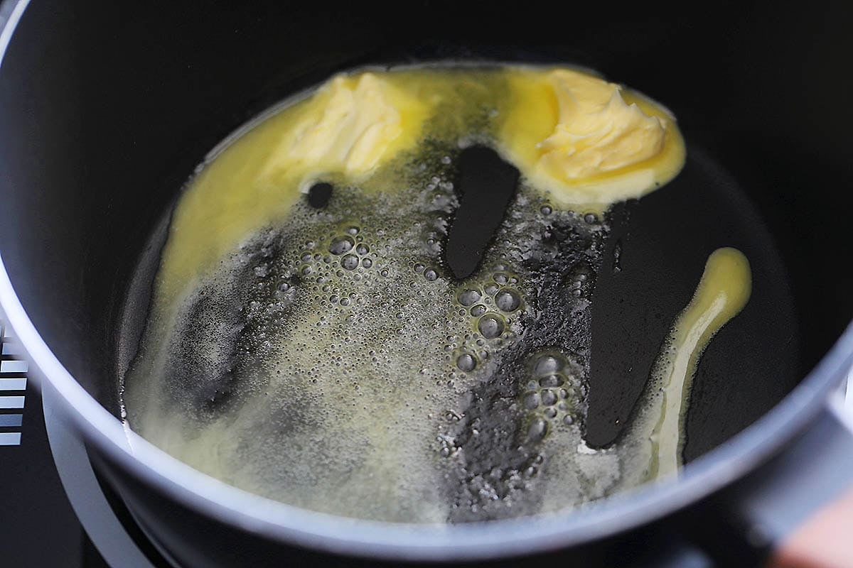 Melted butter in a saucepan.