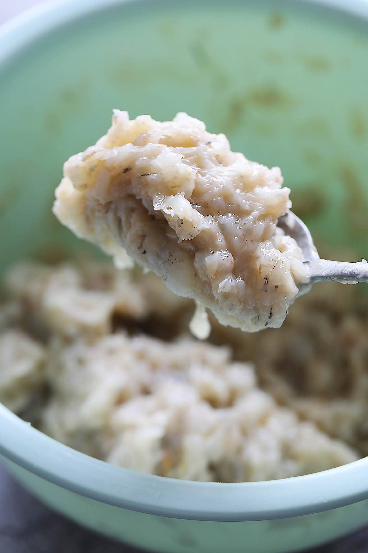 A spoonful of homemade shrimp mousse perfect for making a shrimp appetizer.