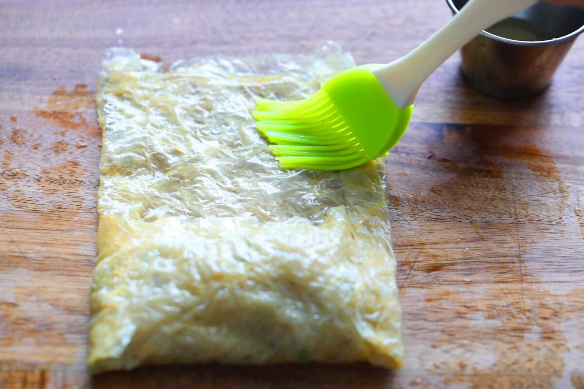 Egg white brushed on the bean curd skin.