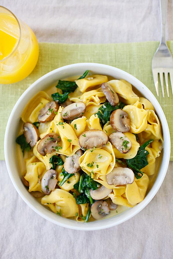 Creamy Mushroom Tortellini with rich buttery mushroom sauce in a bowl.