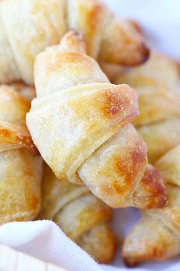 Easy and delicious homemade Crescent Rolls in a basket, ready to serve.