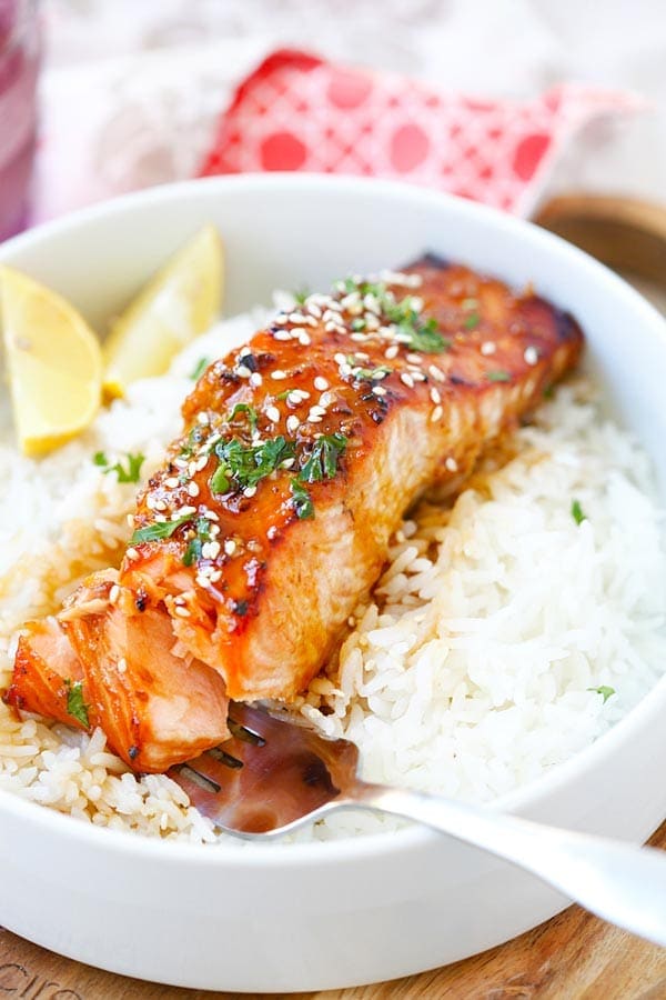 Oven baked Ginger Garlic Baked Salmon on top of rice.